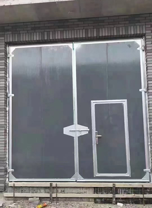 西和工业平开门在大型设备制造车间的应用实例